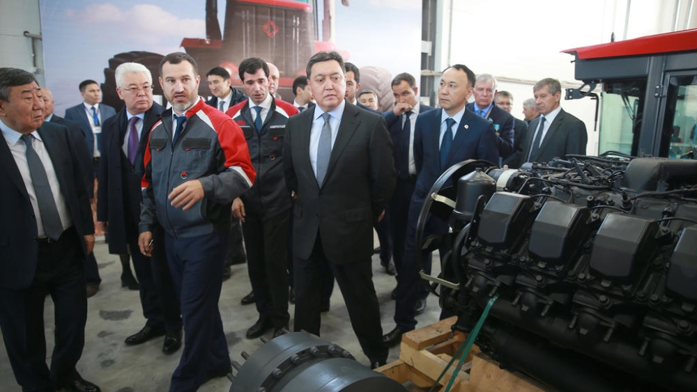 Prime Minister Askar Mamin tests first Kirovets tractor manufactured in Kazakhstan